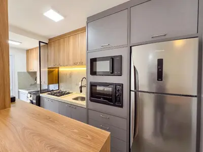 A cozinha ou kitchenette de 110 - Apto com 02 quartos, próximo à praia!