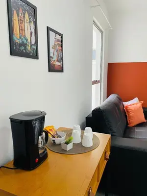 Uma área de estar em Lindo ap em condomínio fechado