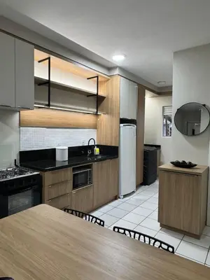 A cozinha ou kitchenette de Apartamento dois quartos Aconchegante e bem localizado