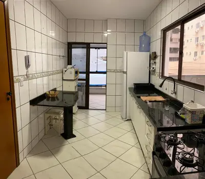 A cozinha ou kitchenette de Apartamento Meia Praia