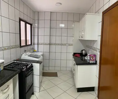 A cozinha ou kitchenette de Apartamento Meia Praia
