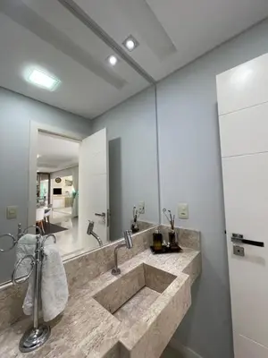 Uma casa de banho em Apartamento 4 suítes perto do mar