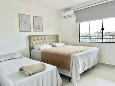 Uma cama ou camas num quarto em Lindo! Apto na vila de Palmas - ZI04I