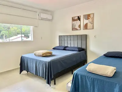 Uma cama ou camas num quarto em Lindo! Apto na vila de Palmas - ZI04I