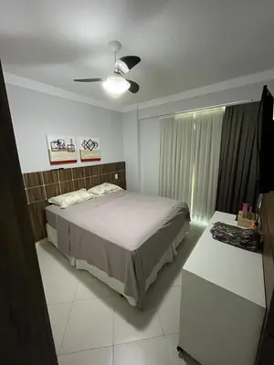 Uma cama ou camas num quarto em Apartamento próximo à praia e ao Hard Rock Café