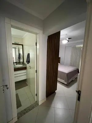 Uma cama ou camas num quarto em Apartamento próximo à praia e ao Hard Rock Café