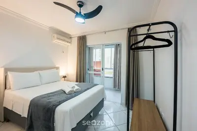 Uma cama ou camas num quarto em Aptos em Condomínio a 40 metros da Praia de Bombinhas - BDSs