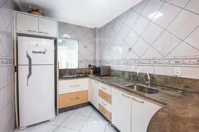 A cozinha ou kitchenette de Aptos em Condomínio a 40 metros da Praia de Bombinhas - BDSs