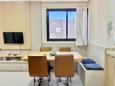 Uma televisão e/ou sistema de entretenimento em Lindo! Apto na praia de Palmas! AK01J