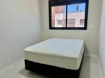 Uma cama ou camas num quarto em Lindo! Apto na praia de Palmas! AK01J