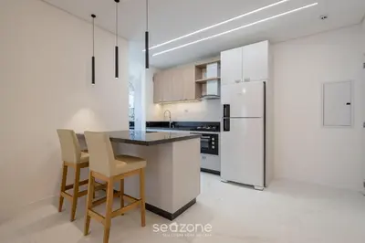 A cozinha ou kitchenette de Estadia completa a 500m do mar em Itapema - STWs