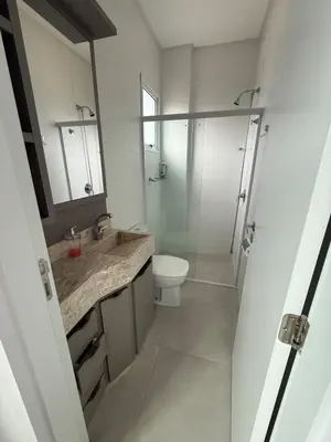 Uma casa de banho em Apartamento Porto Belo SC, perto da praia