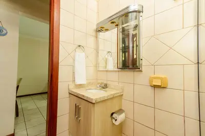 Uma casa de banho em Apto aconchegante na Barra Sul DD5438