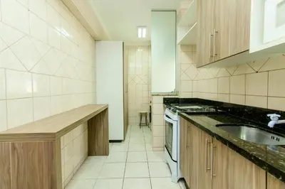 A cozinha ou kitchenette de Apto aconchegante na Barra Sul DD5438