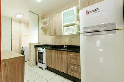 A cozinha ou kitchenette de Apto aconchegante na Barra Sul DD5438