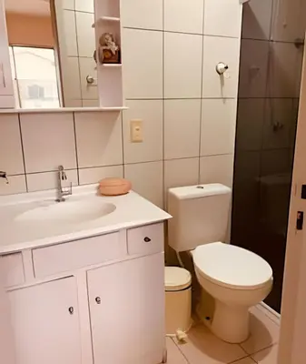 Uma casa de banho em Apartamento no Centro de Bombinhas a 100m da Praia