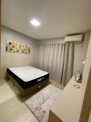 Uma cama ou camas num quarto em Casa Bella Mar - Apartamento Meia Praia