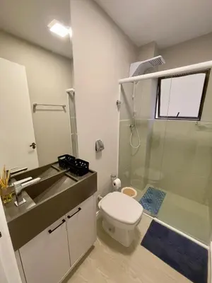 Uma casa de banho em Casa Bella Mar - Apartamento Meia Praia