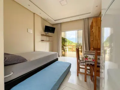 Uma televisão e/ou sistema de entretenimento em LOFT SOL e MAR exclusivo em bombinhas, 50 metros do mar
