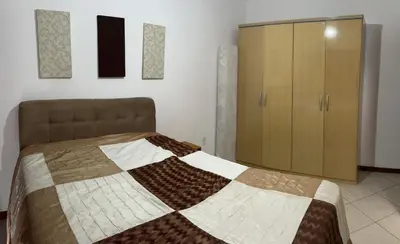 Uma cama ou camas num quarto em Condomínio San Victor