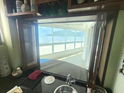 A cozinha ou kitchenette de Apartamento 3 dormitórios frente mar