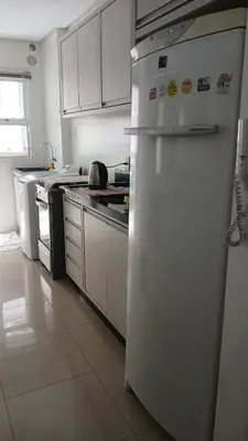 A cozinha ou kitchenette de Apartamento 3 quartos praia de Bombas