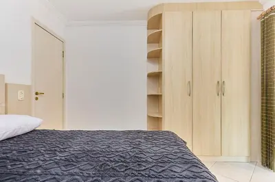 Uma cama ou camas num quarto em 1139 Lindo e Confortável apartamento em Bombinhas Centro