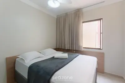 Uma cama ou camas num quarto em Cobertura a 60m do Mar Meia Praia PAT0402