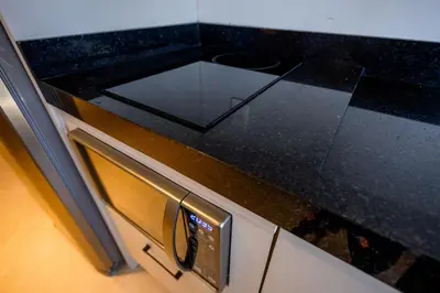 A cozinha ou kitchenette de Loft confortável em condominio com Piscina