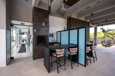 A cozinha ou kitchenette de Loft confortável em condominio com Piscina