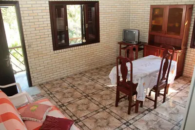 Uma televisão e/ou sistema de entretenimento em Residencial Aracuã