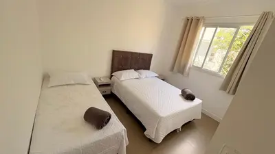 Uma cama ou camas num quarto em palmas beach