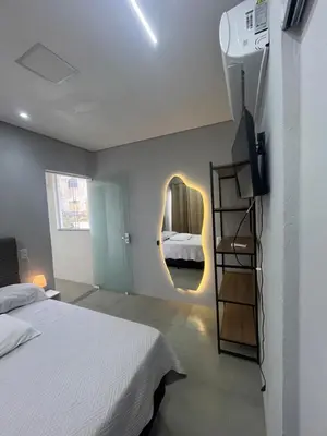 Uma cama ou camas num quarto em Recanto do Sol