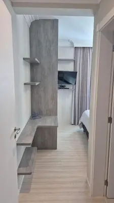Uma cama ou camas num quarto em 3 quartos Meia Praia - Itapema - family with baby