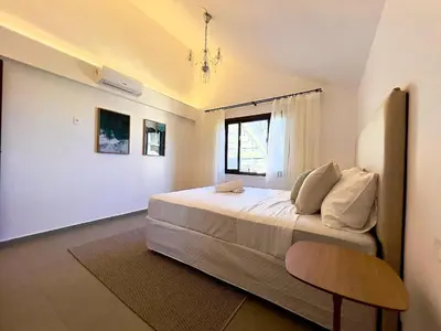 Uma cama ou camas num quarto em ASA | Casa Frente Mar | Pé na Areia | Piscina | BC