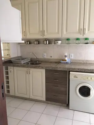 A cozinha ou kitchenette de Apartamento 3 quartos com ar a 150 metros praia de Bombas
