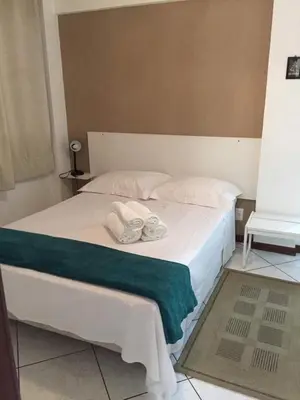 Uma cama ou camas num quarto em Apartamento 3 quartos com ar a 150 metros praia de Bombas