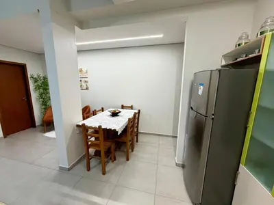 A cozinha ou kitchenette de Confortável Apto Térreo a 185m da Praia Palmas 7