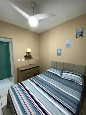 Uma cama ou camas num quarto em Casa Sol e Mar