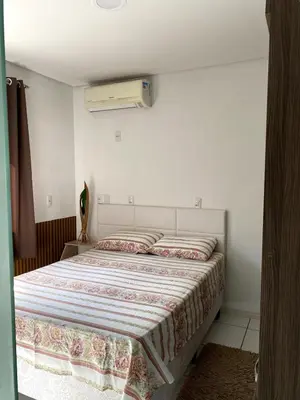 Uma cama ou camas num quarto em Casa Sol e Mar