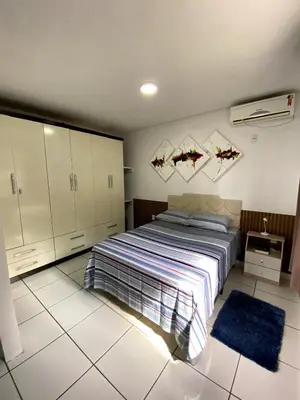 Uma cama ou camas num quarto em Casa Sol e Mar