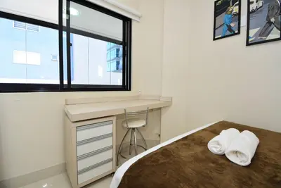 Uma cama ou camas num quarto em Aconchego em Itapema a 30 metros do Mar - ITA002