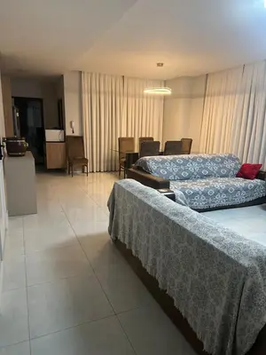 Uma cama ou camas num quarto em Apartamento em Meia Praia
