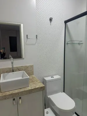 Uma casa de banho em Apartamento em Meia Praia