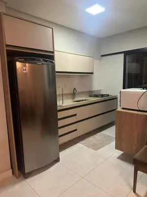 A cozinha ou kitchenette de Apartamento em Meia Praia