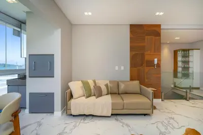 Uma área de estar em Duplex Alto Padrão Frente Mar com Piscina - 1149