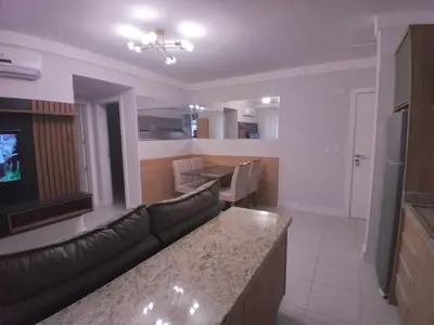 Uma área de estar em Clube do Mar-rua 224-Itapema Meia Praia Apt 102 B