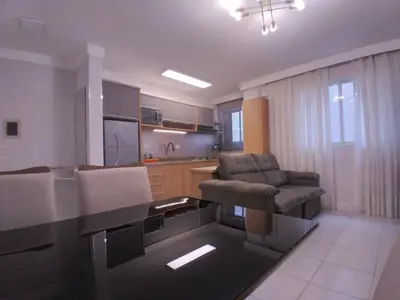Uma área de estar em Clube do Mar-rua 224-Itapema Meia Praia Apt 102 B