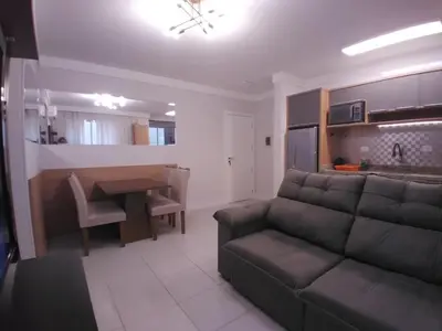 Uma área de estar em Clube do Mar-rua 224-Itapema Meia Praia Apt 102 B