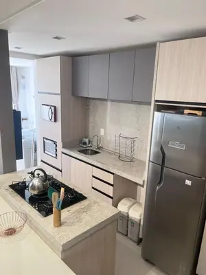 A cozinha ou kitchenette de Apartamento Itapema alto padrão 5 pessoas